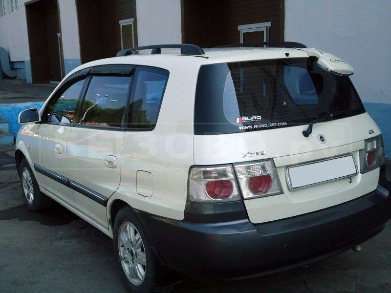 Kia X Trek minivan pierwszej generacji 2.0 TD MT (2003 2005)